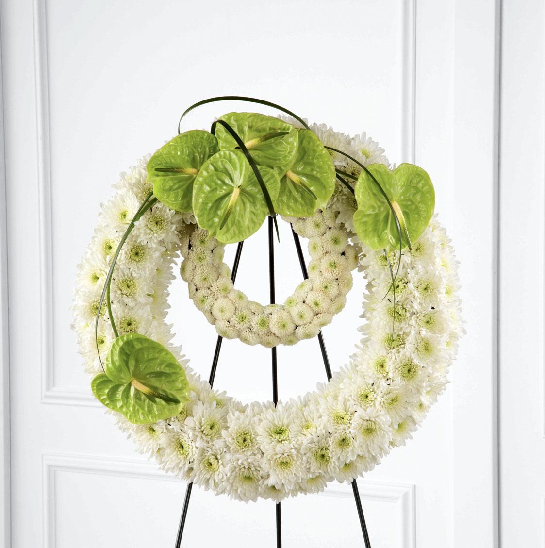 S10-4458 La Couronne  FTD® Gerbe du Souvenir 